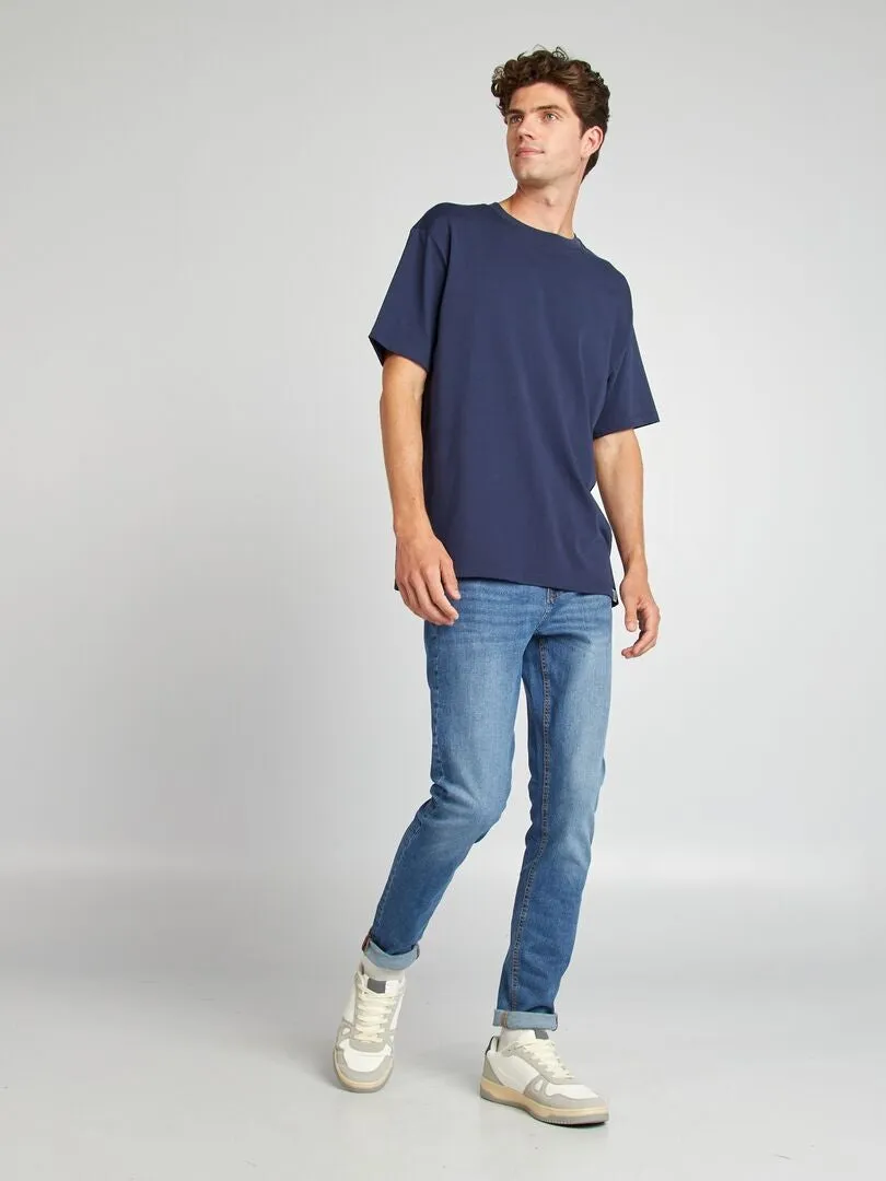 VAQUERO SLIM CON 5 BOLSILLOS  L34  AZUL